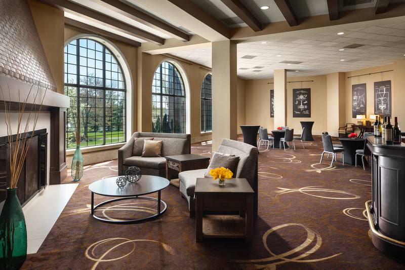 Fireside lobby lounge with arched windows
